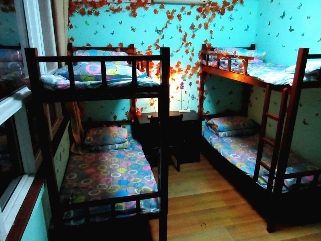 25°C Four Season Youth Hostel Qingdao Habitación foto