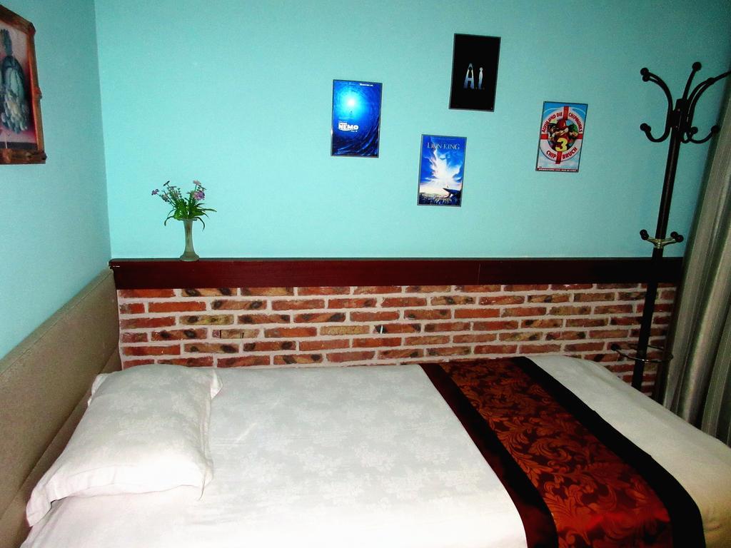 25°C Four Season Youth Hostel Qingdao Habitación foto