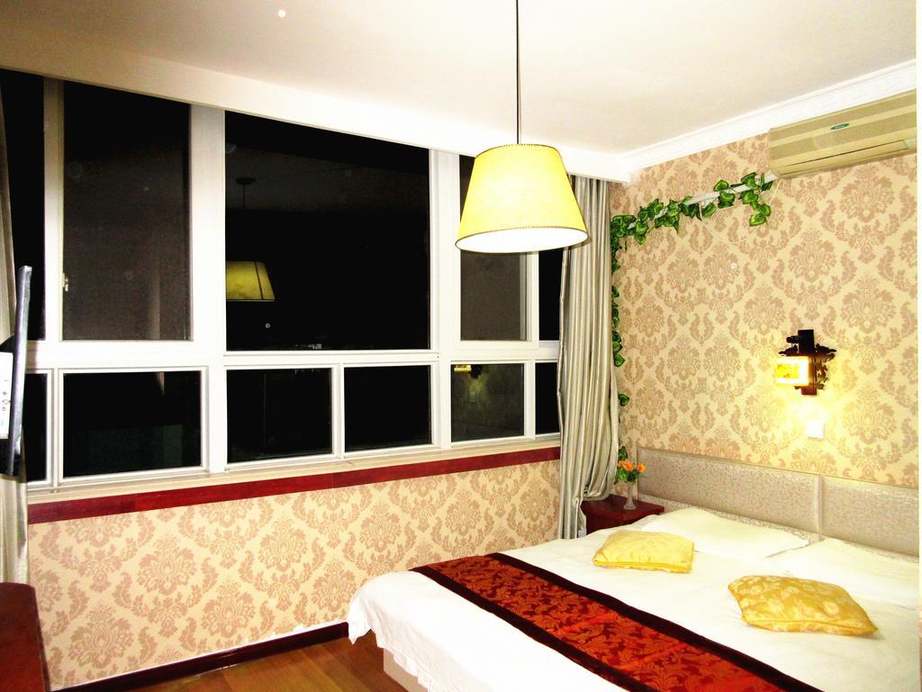 25°C Four Season Youth Hostel Qingdao Habitación foto