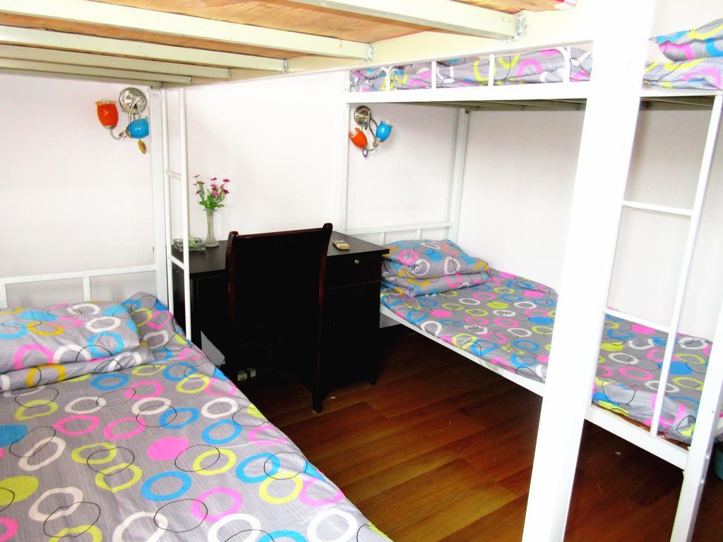 25°C Four Season Youth Hostel Qingdao Habitación foto