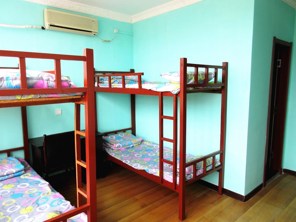 25°C Four Season Youth Hostel Qingdao Habitación foto
