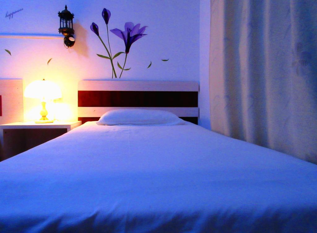 25°C Four Season Youth Hostel Qingdao Habitación foto