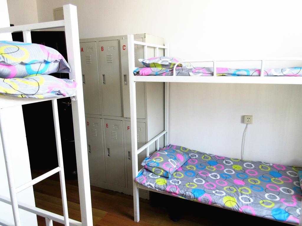 25°C Four Season Youth Hostel Qingdao Habitación foto