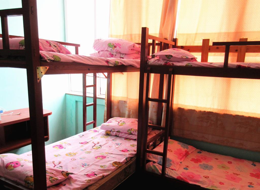 25°C Four Season Youth Hostel Qingdao Habitación foto